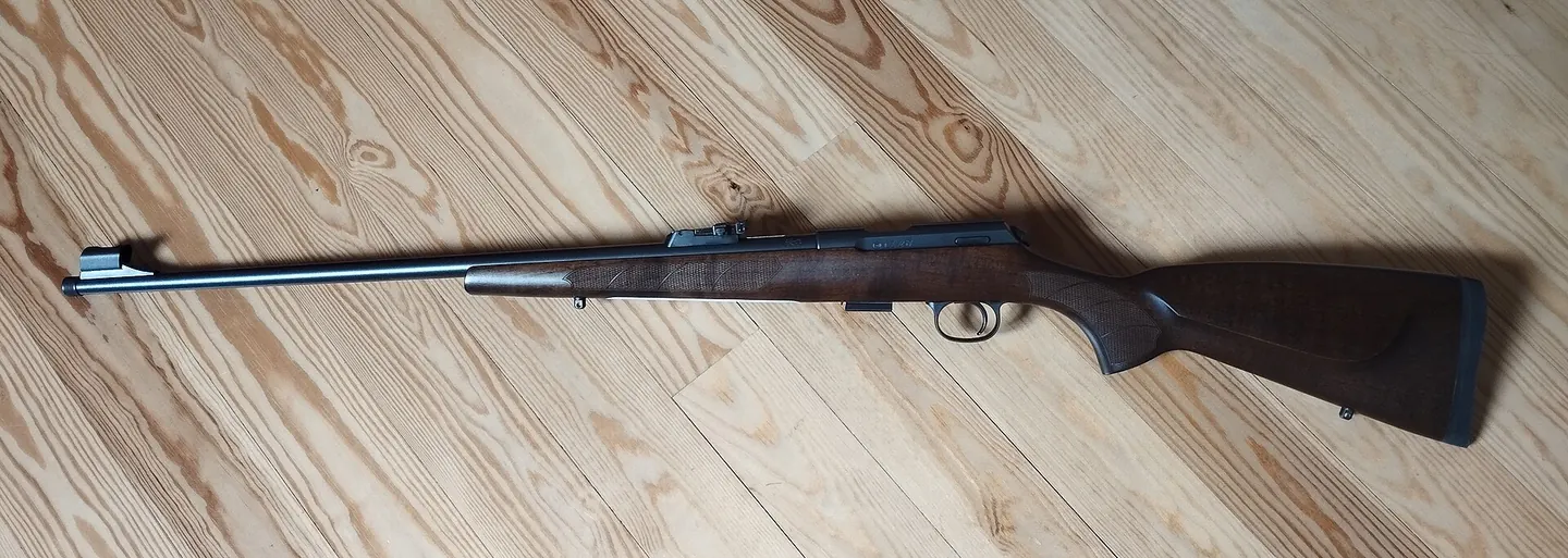 CZ 457 Lux rimfire rifle with walnut stock, side view